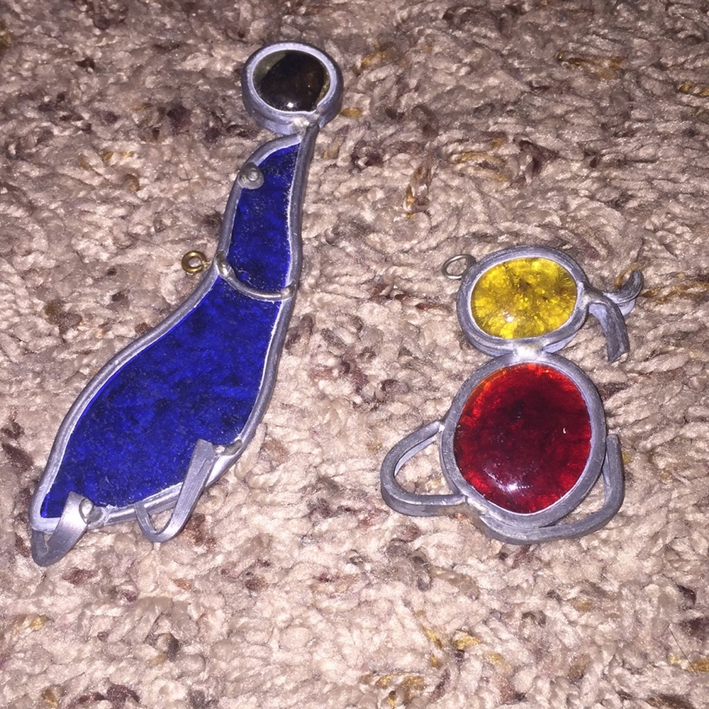 Two Red, Yellow & Blue Glass Hanging Figures